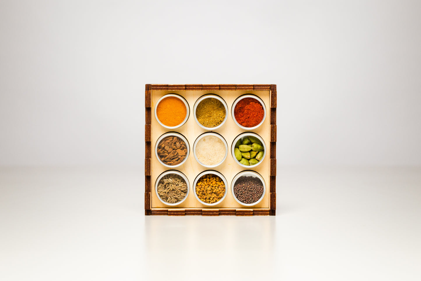 SUNISTANAI Ayurvedic Handcrafted Spice Box full of all the staple Ayurveda Spices to enhance one's culinary experience.